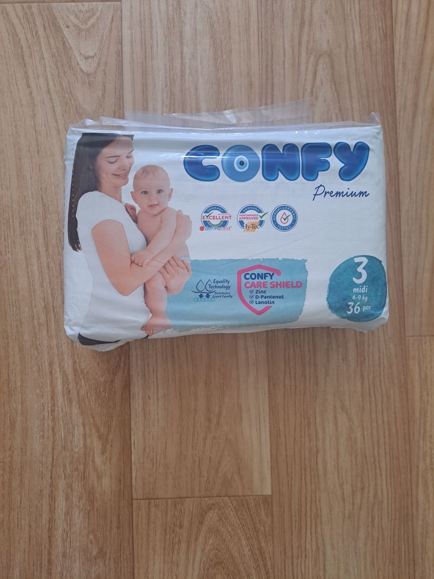 Продам памперсы Confy Premium 4 упаковки