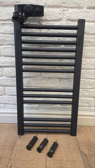 Стильный и экономичный электрический полотенцесушитель в ванную