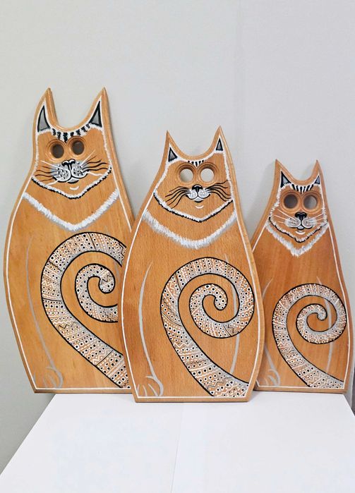 Na prezent koty na deskach