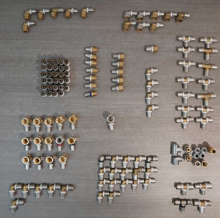 Duży zestaw złączek trójników kolanek PEX