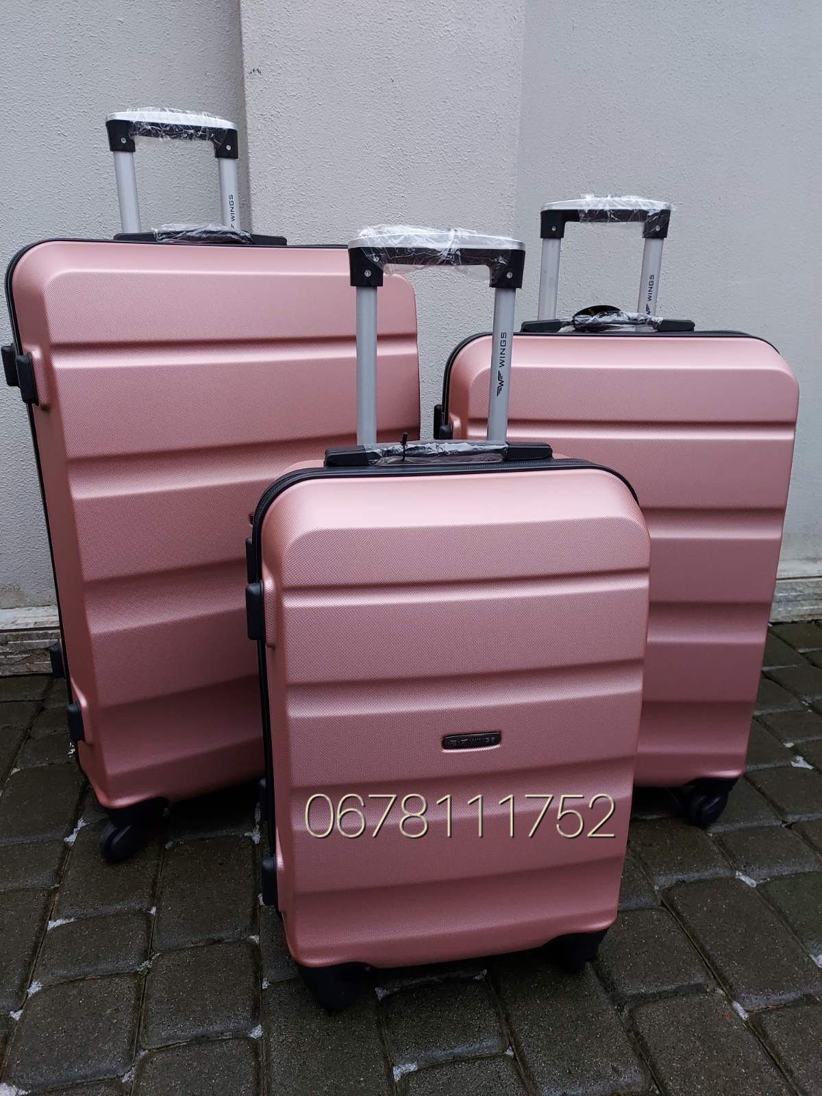 WINGS AT 01 Польща валізи чемоданы сумки на колесах