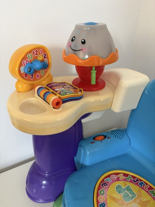 Krzesełko grające Fisher Price