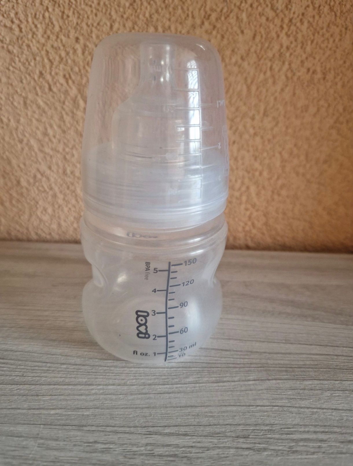 Butelka antykolkowa Lovi 150ml + pojemnik na mleko