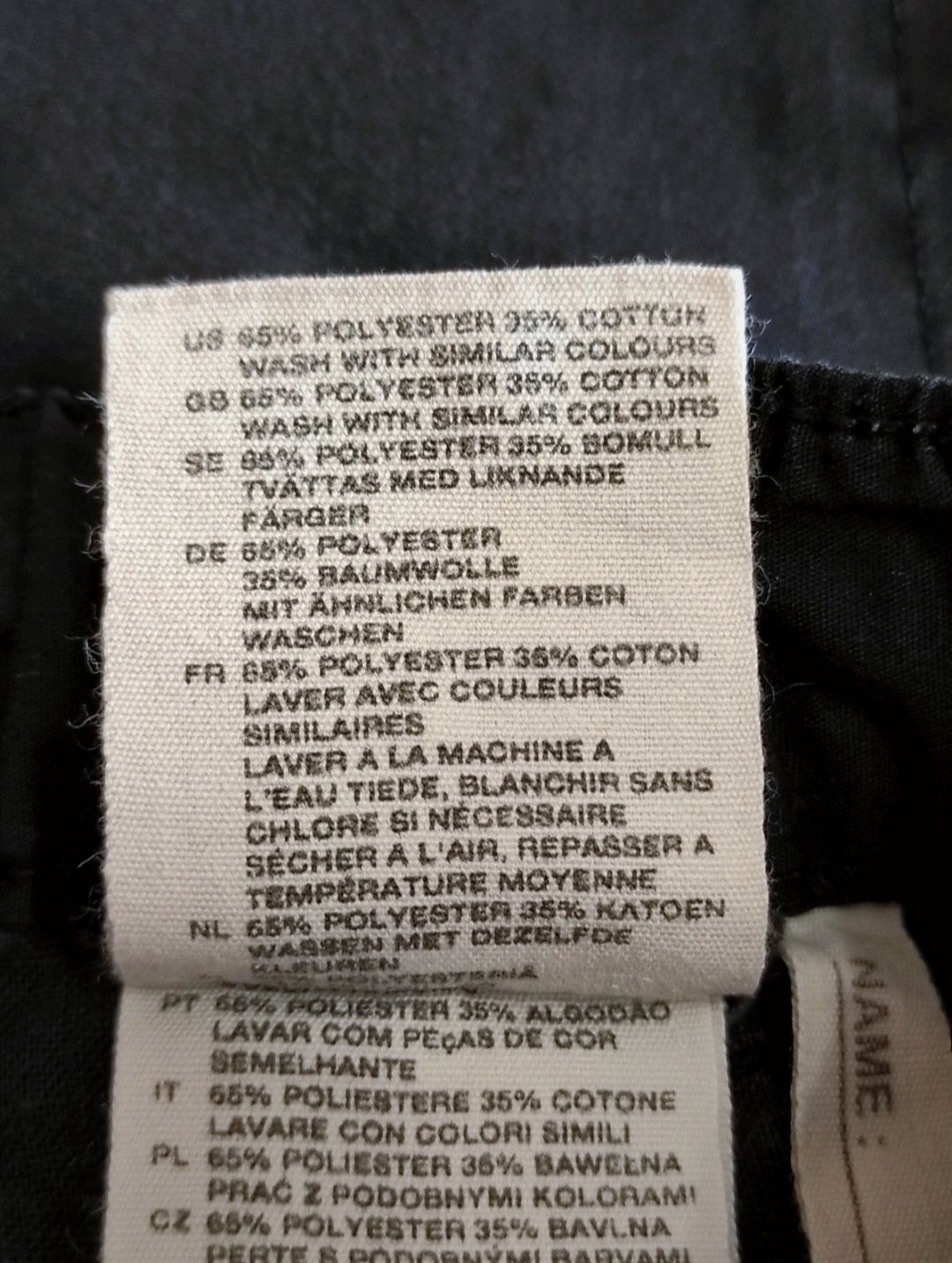 Krótkie spodenki bermudy czarne  dłuższe H&M 110