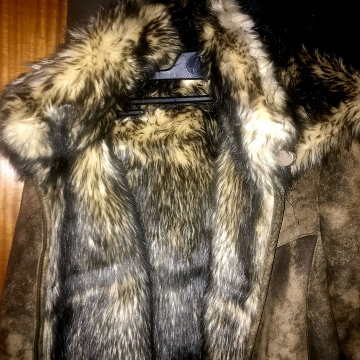 Casaco de  pelo,macio e confortável,Com capuz.