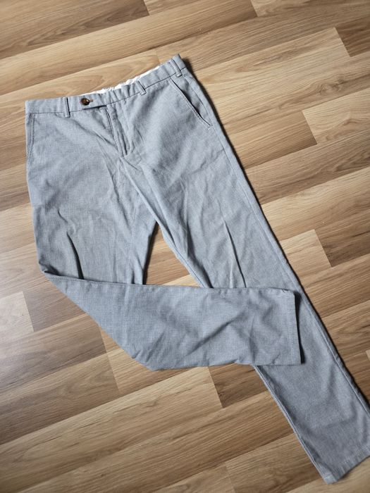 Męskie spodnie eleganckie w kratkę zara L