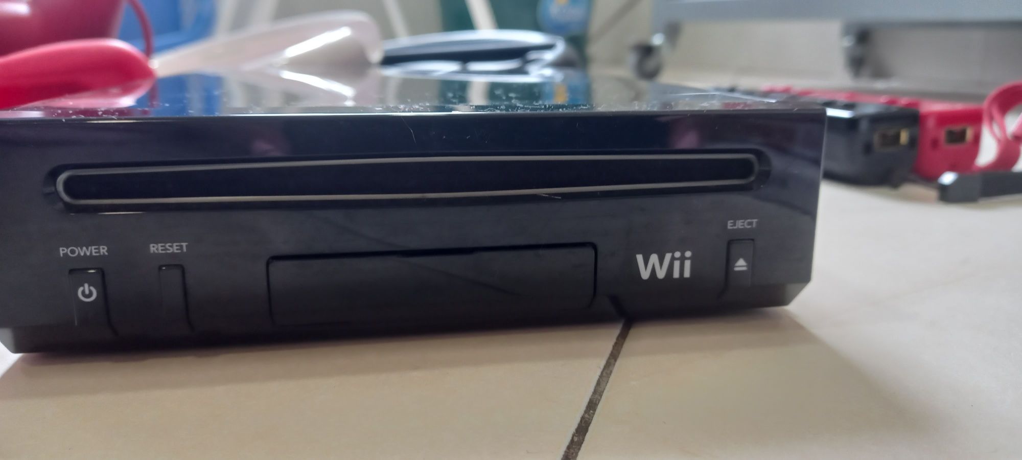 Consola Wii com prancha e 4 jogos