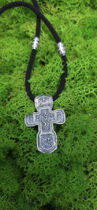 Срібний хрест на шовковому шнурку