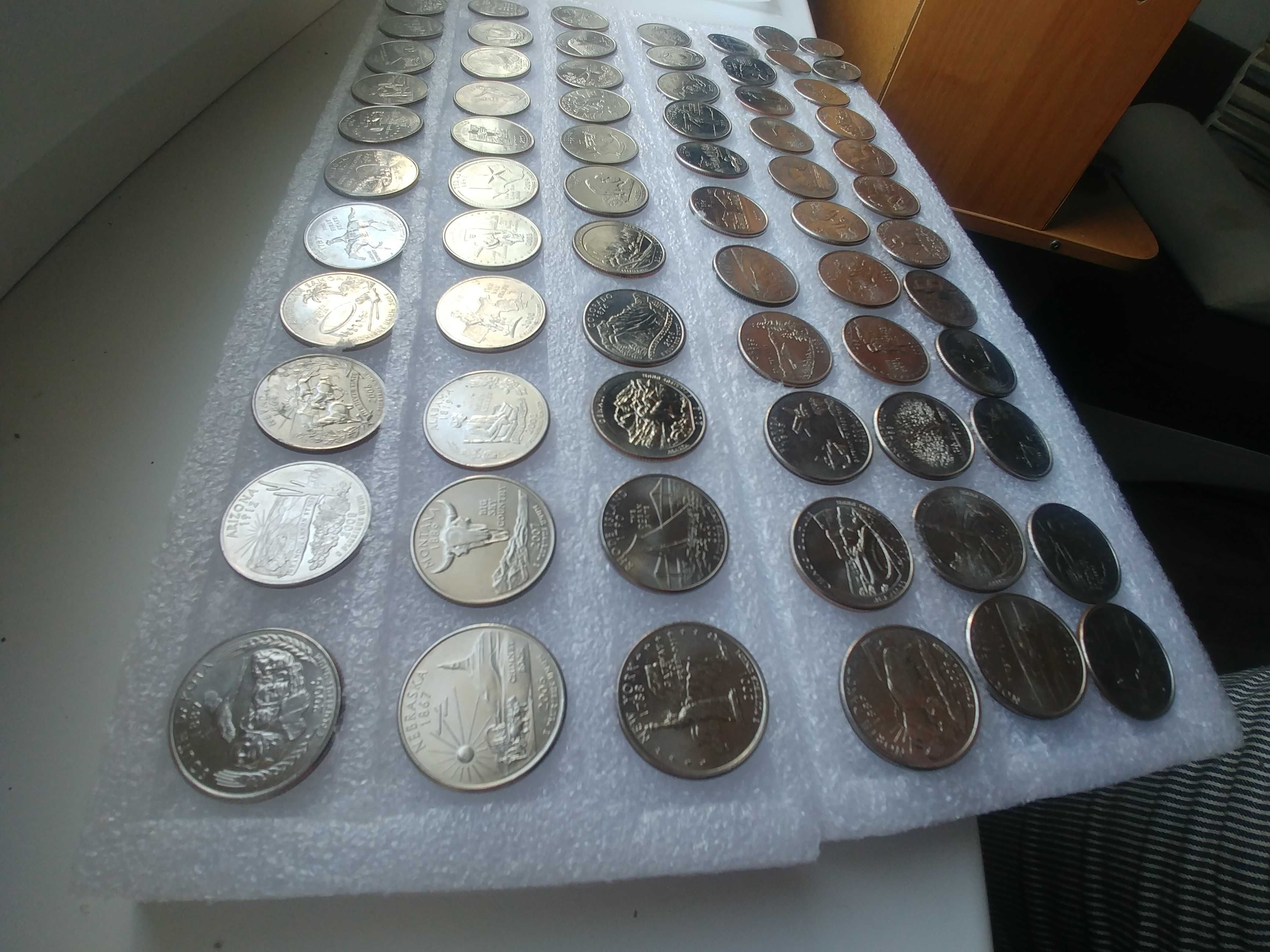 25-центовые монеты(65 шт.и 4шт. 5-центовые)