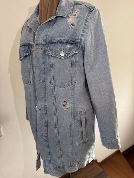 Подовжена дзинсовка із потертостями
