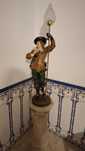 Estatueta com candeeiro