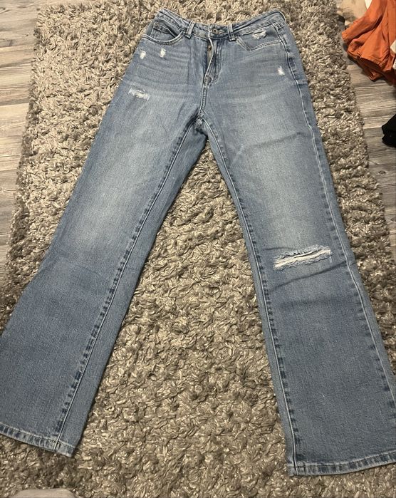 Jeansy dzwony niebieskie 36, z przetarciami