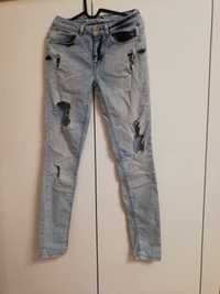 Jeans spodnie z dziurami 36