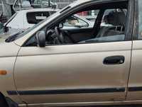 Toyota Carina E 1.6i 4D 1992 r.Drzwi przednie lewe.