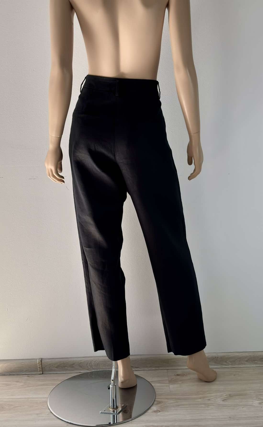 Massimo Dutti nowe spodnie damskie L
Rozmiar L 
Kolor:czarny 
Stan:now