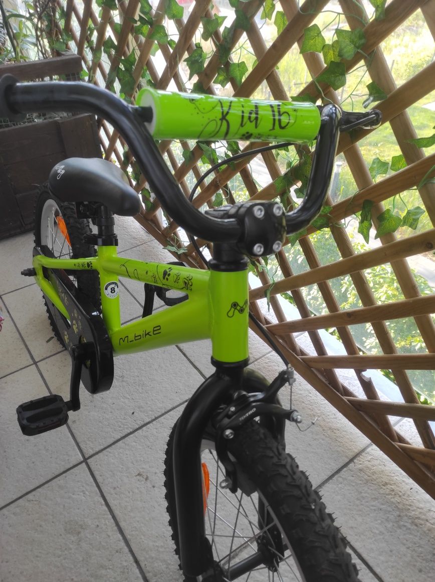 Rower M_Bike QKI 16, kółka boczne, ochraniacze