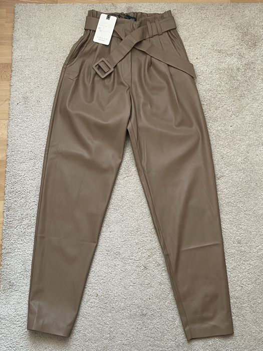 Нові брюки з еко шкіри