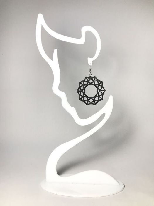 Підставка для сережок у вигляді силуету обличчя