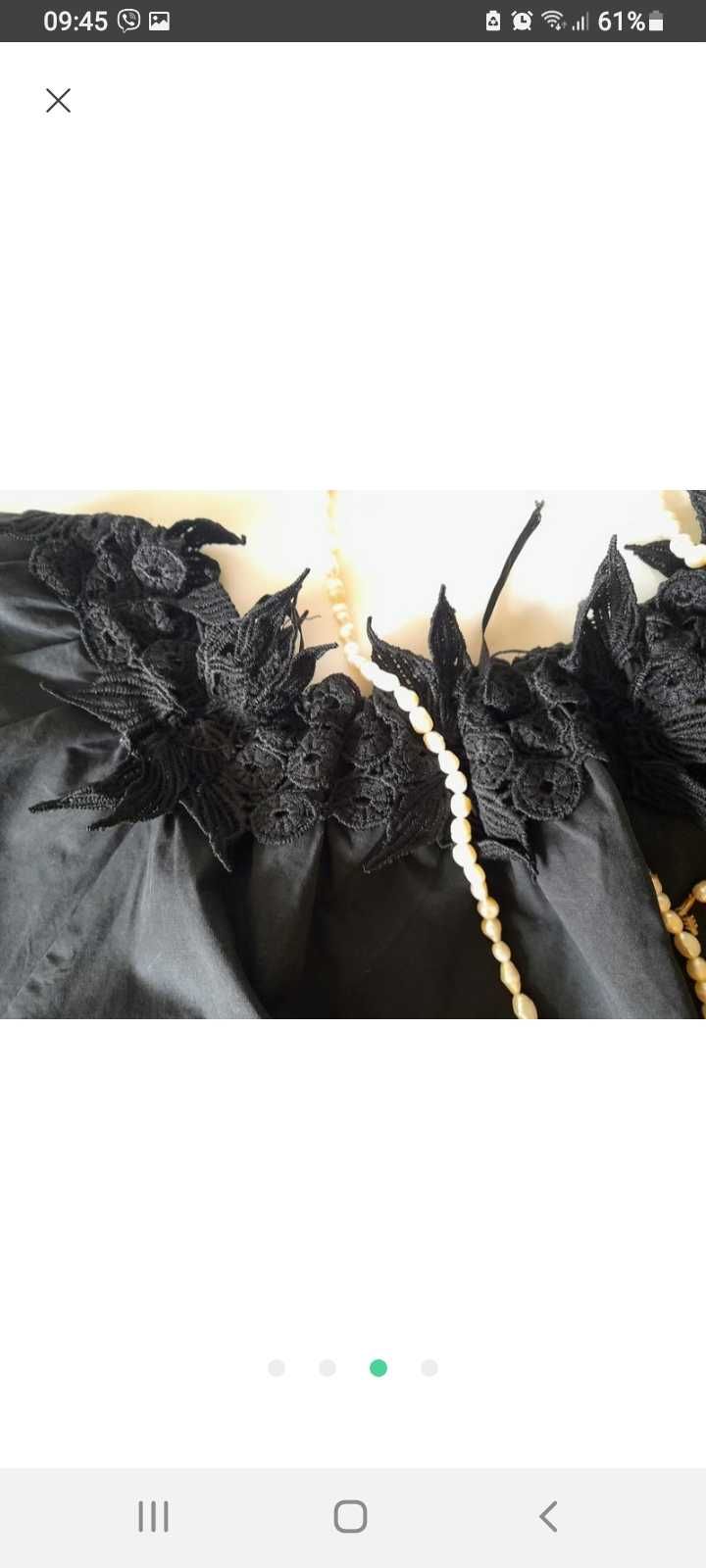 Гарнюча блуза чорного кольору з короткими рукавами