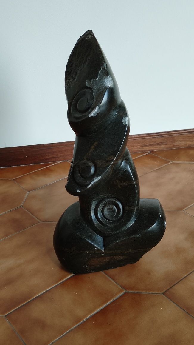 Estatueta em pedra