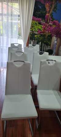Krzesło białe ekoskóra, srebrne metalowe płozy polysk 8 szt