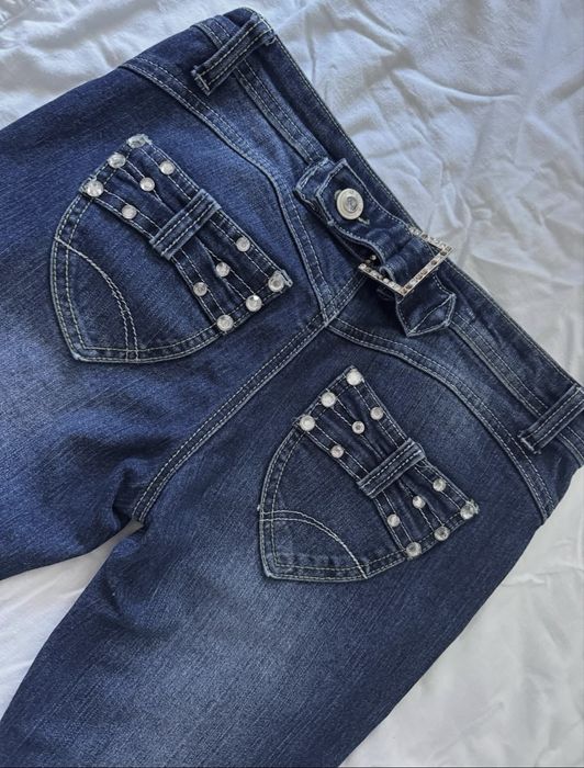 вінтажні кльош джинси на низькій посадці