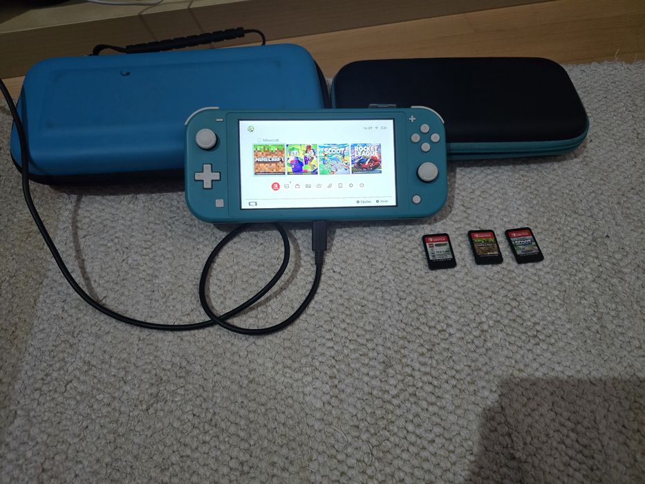 Nintendo Switch Lite + capa de protecção + 3 jogos