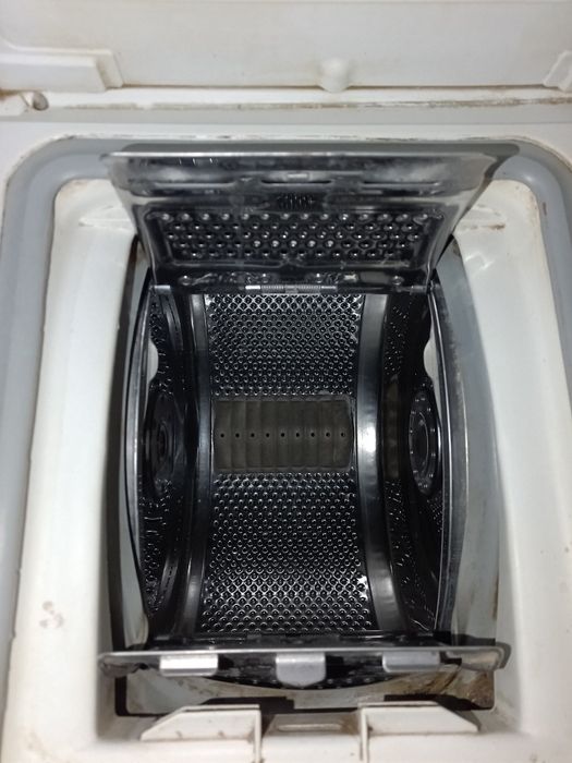 Пральна машинка вертикального завантаження