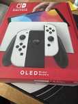 Nintendo Switch OLED White +futerał Orzly +karta samsung 256GB+szklo