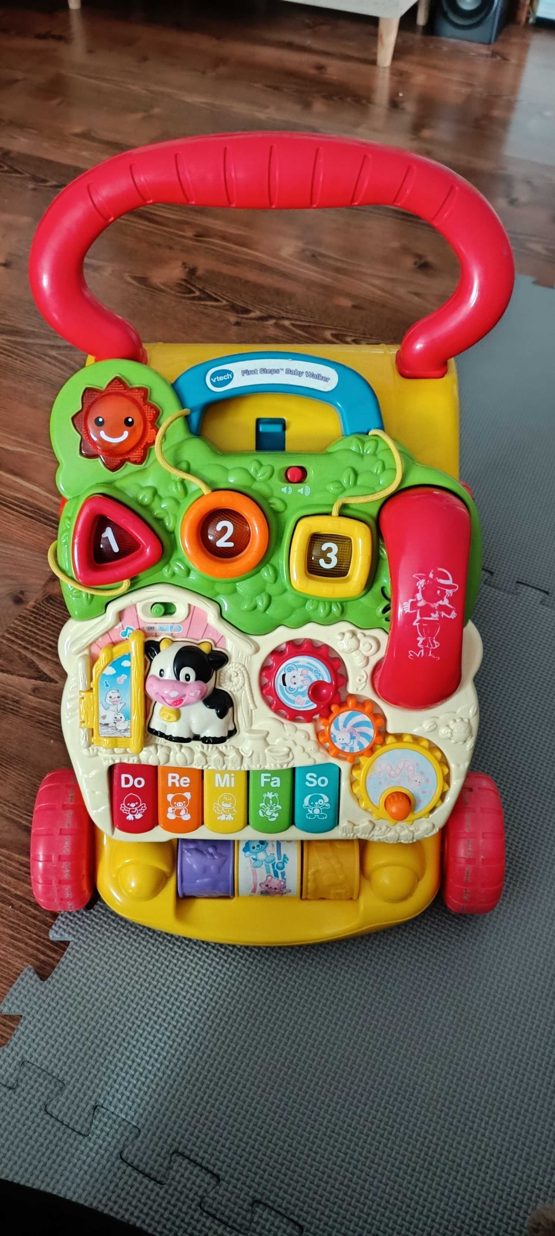 Pchacz jeździk vtech