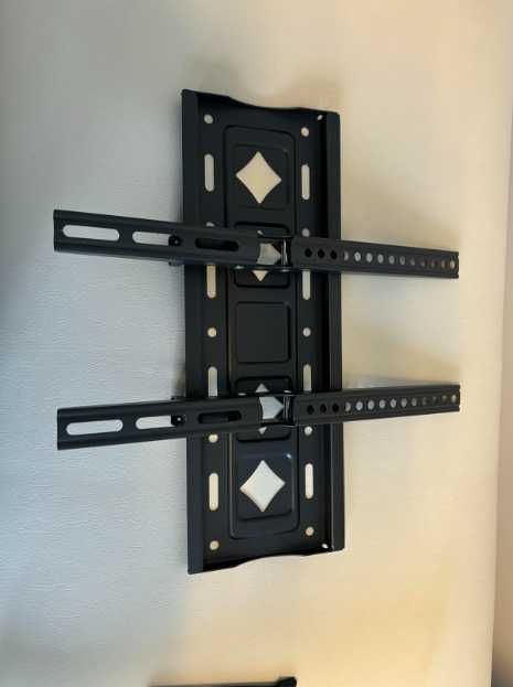 Кріплення для телевізора на стіну
