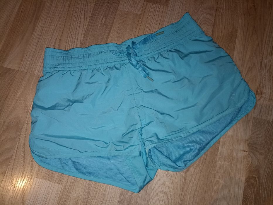 Błękitne sportowe spodenki do biegania H&M Sport L 40