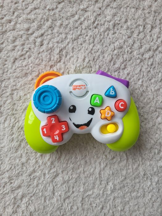 Fisher-Price, Wesoły Padzik Malucha, interaktywna zabawka edukacyjna