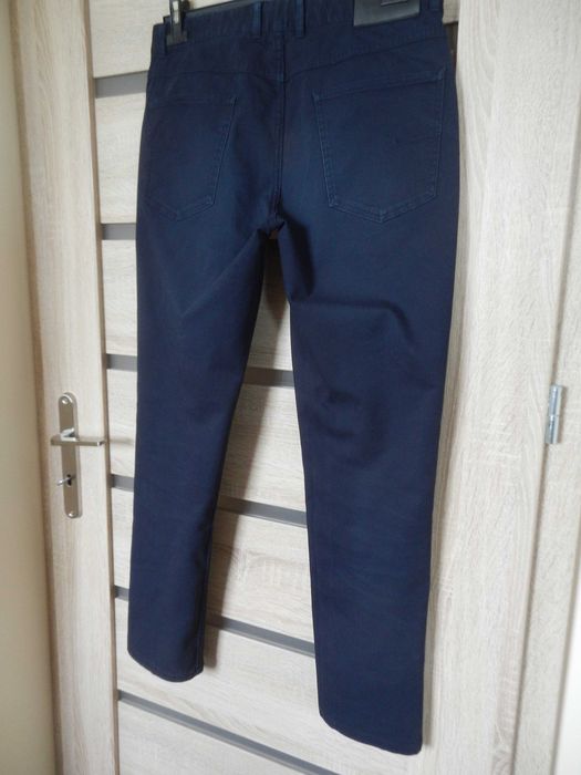 Granatowe bawełniane spodnie męskie chino r. 31