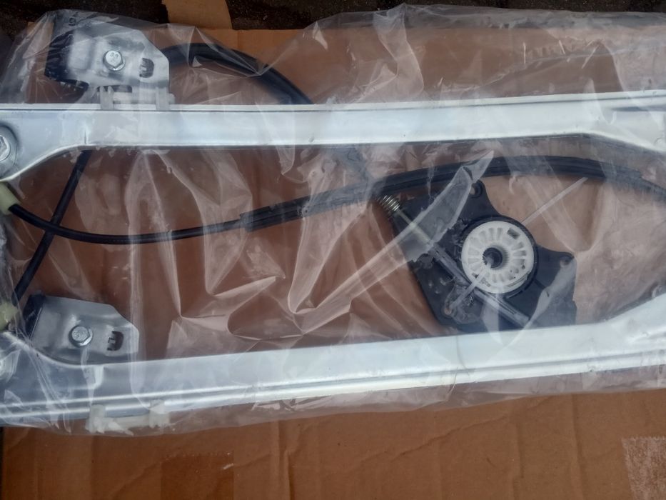 Склопідйомник лівий стеклоподемник  Пасат Б5 шкода суперб  новий