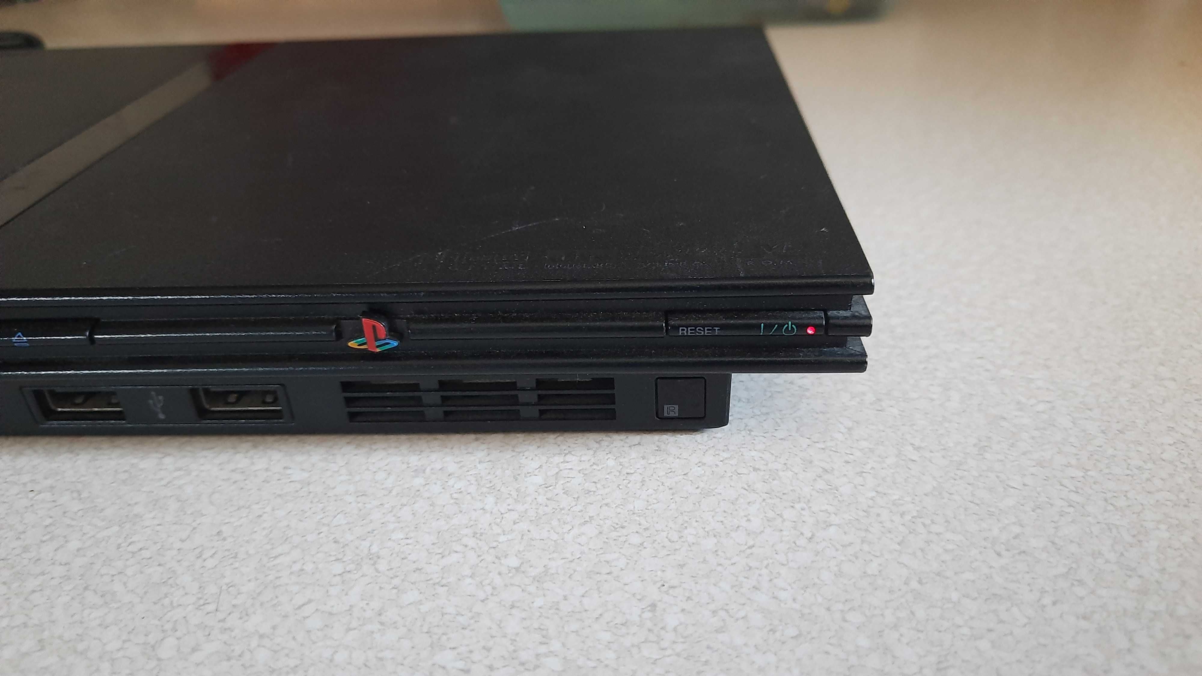 Konsola PS2 Playstation 2 z zasilaczem i kartą pamięci 8mb.