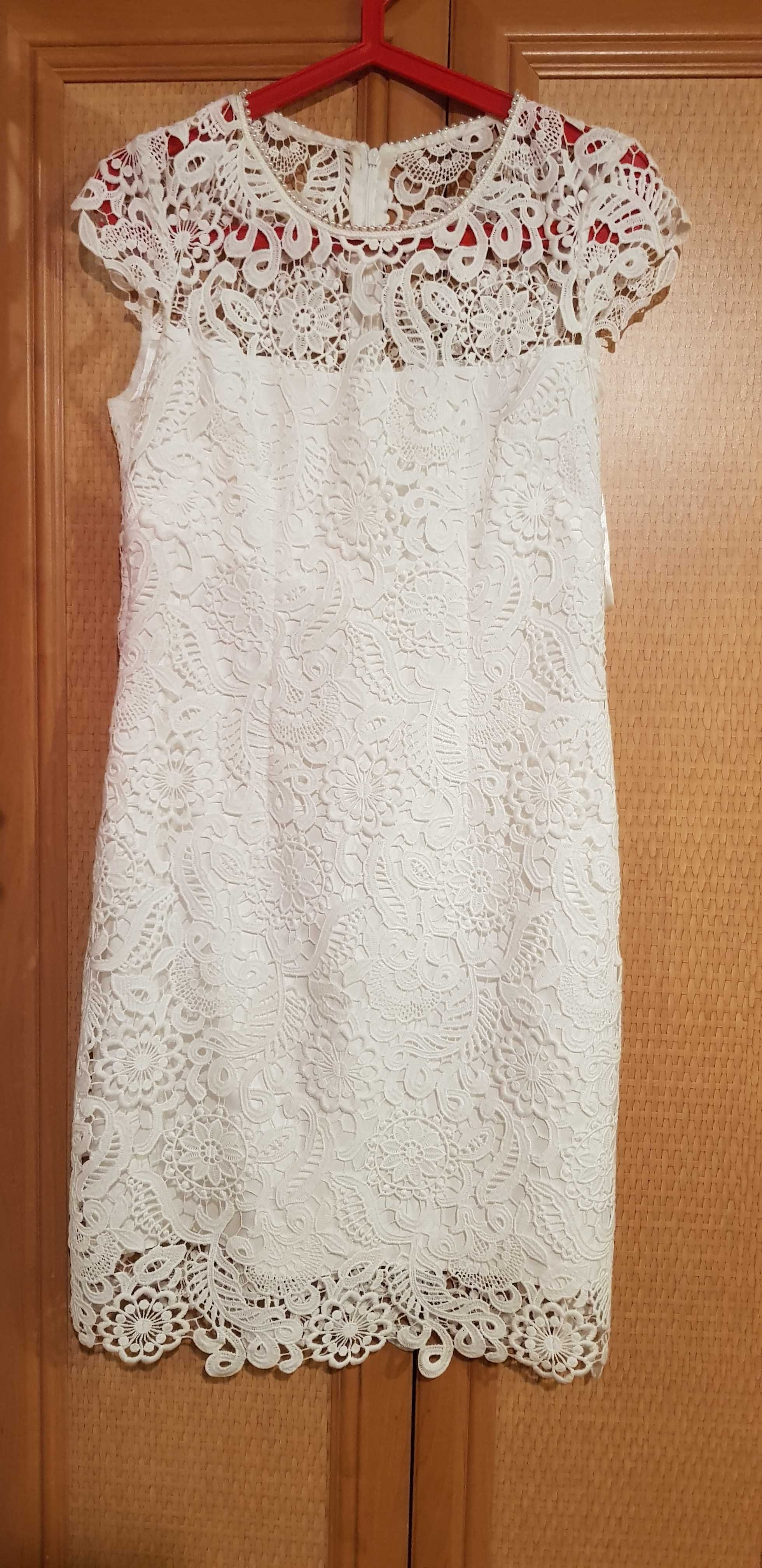 Biała ażurowa sukienka
