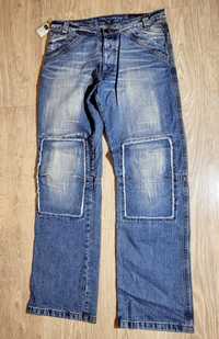 Spodnie jensowe W34 L34 łaty szerokie nogawki
 kieszonek, niebieskie p