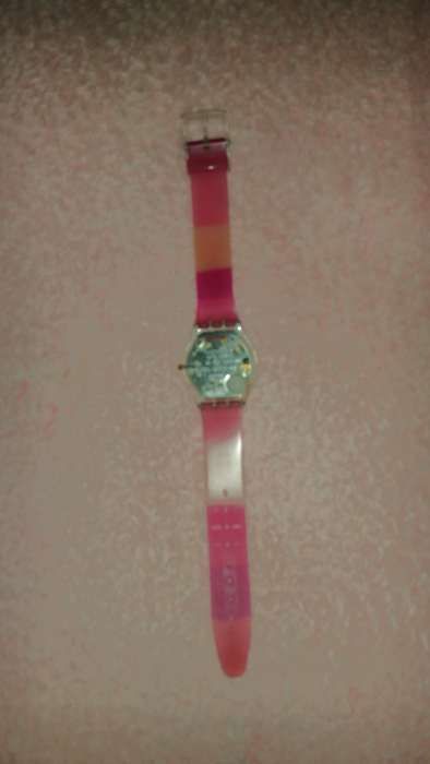 relogio swatch cor de rosa