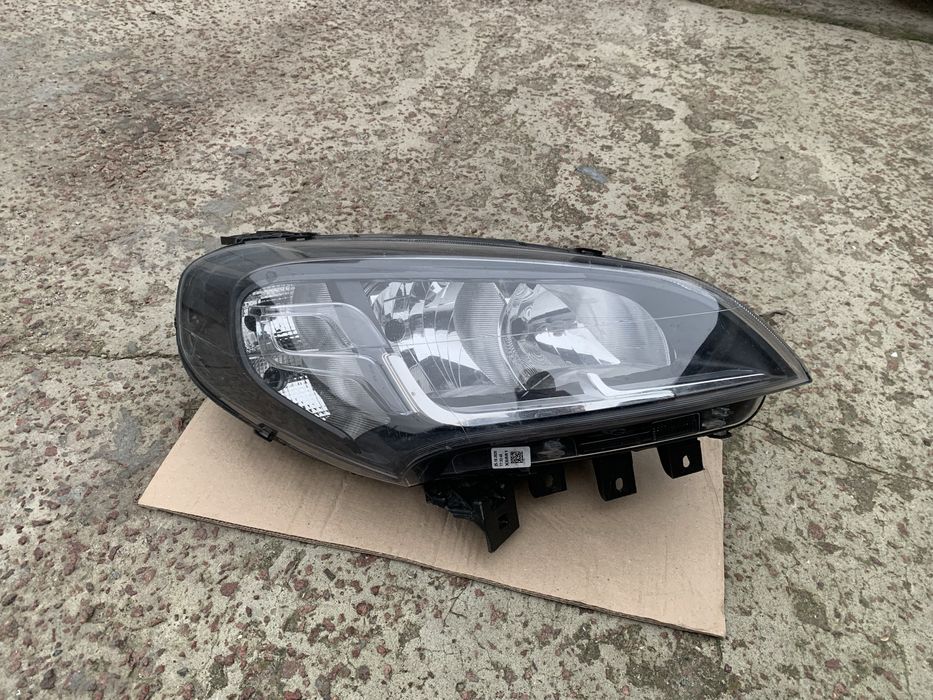 Права фара Fiat Doblo оригінал чорна фіат добло