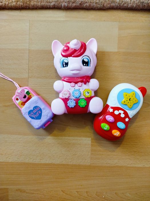 Музичні іграшки. Телефон дитячий . Телефон свинка Пеппа