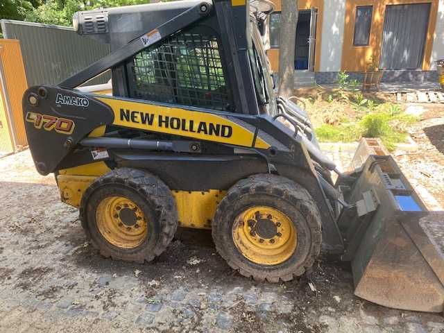 Минипогрузчик Bobcat ,  New Holland , Боб Кэт