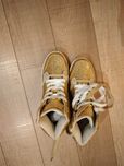 Tenis novos dourados