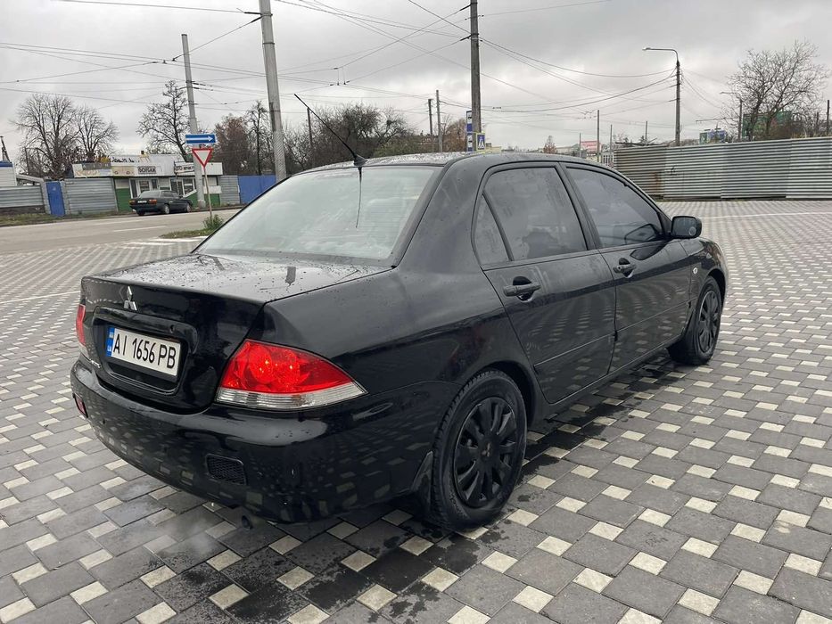 Mitsubishi Lancer 9 1.6 Газ Автомат