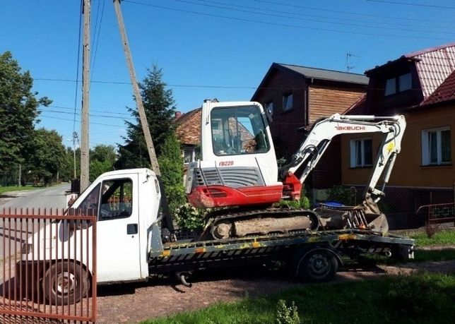 Transport maszyn rolniczych budowlanyh Pomoc Drogowa Laweta Autolaweta