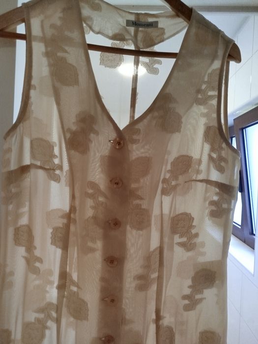 Túnica comprida sem mangas