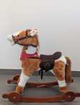 Cavalo baloiço criança