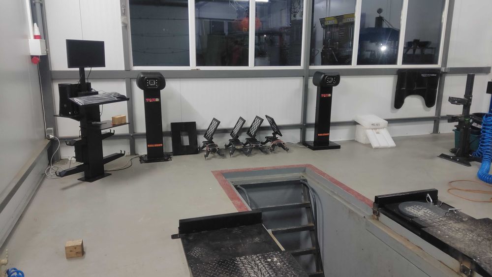 развал- схождения на  яму. Доставка к воротам Вашего сервиса.