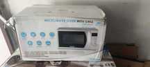Kuchenka mikrofalowa CMG2071DS CANDY 20l srebrny OUTLET F1086