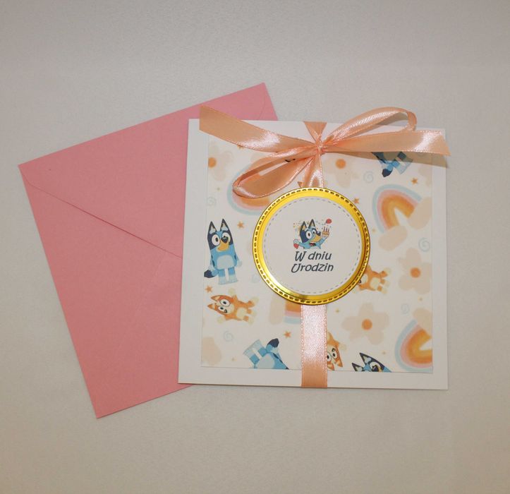 Pieski Bluey i Bingo z bajki Blu kartka dla dzieci różowa pomarańczowa